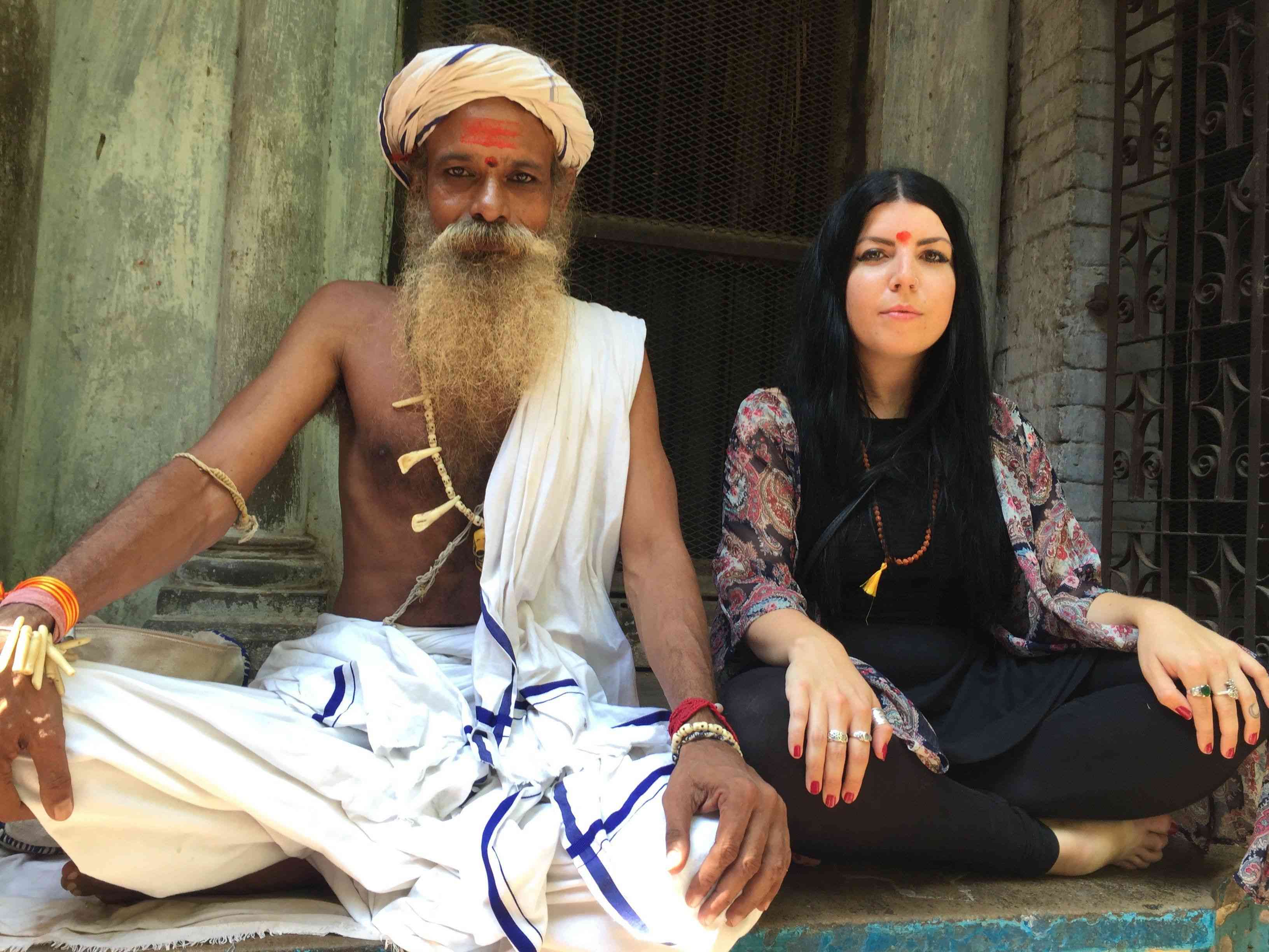 Sadhu with foreigner girl